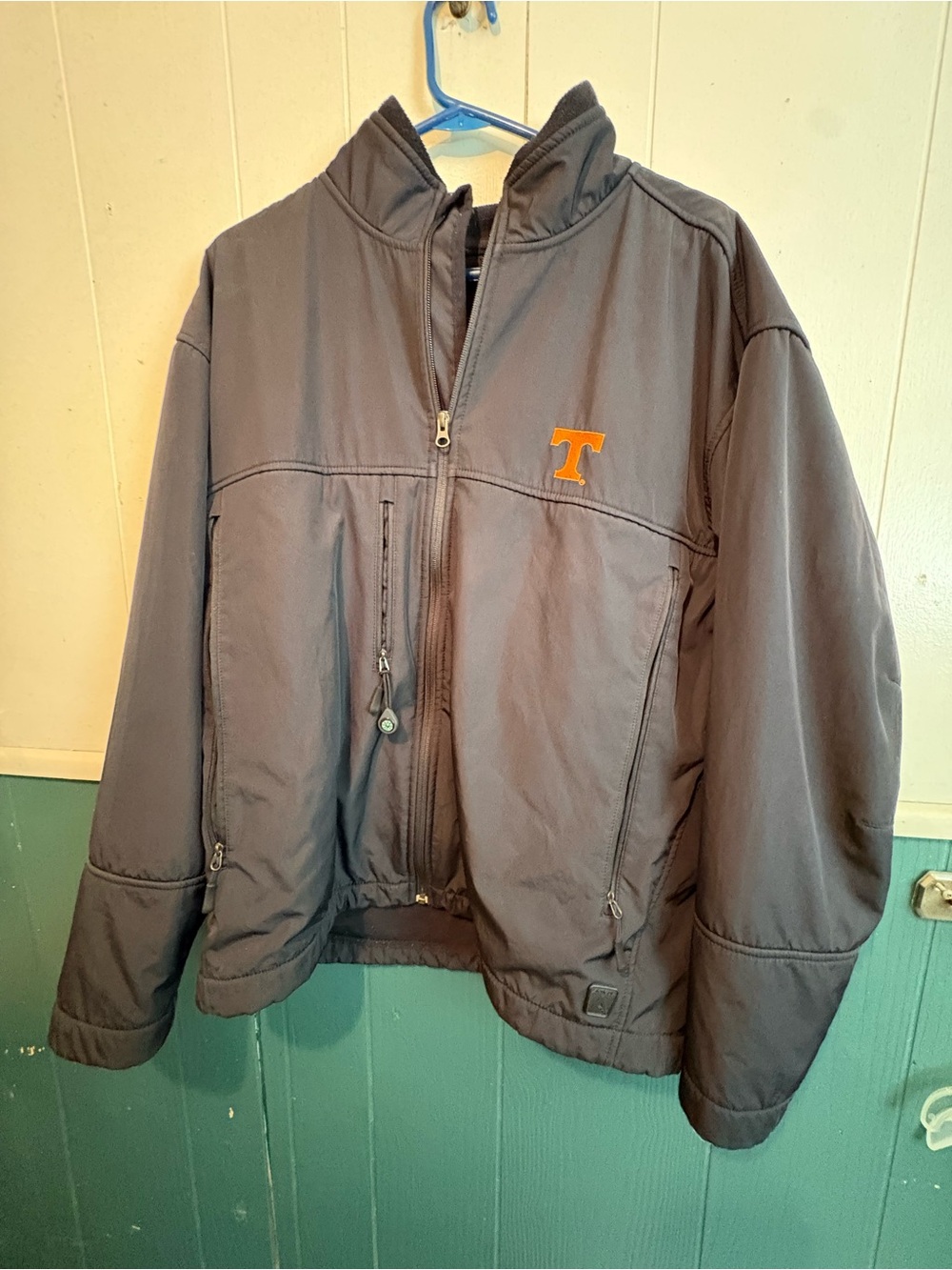 Antigua Gray Puffer Jacket with Orange 'T' Chest Logo